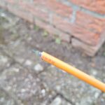 Glasvezelupdate maart 2026 - Close-up: glasvezel wordt met groene folie omhuld
